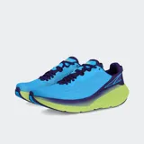 Championes de running Altra FWD VIA, color celeste con detalles en violeta y suela verde.
