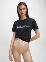 Bombacha bikini color piel con cintura elástica con logo Calvin Klein y ribetes de encaje floral.