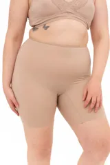 Calza biker modeladora sin costuras color tostado, de tiro alto y efecto segunda piel, confeccionada con fibra LYCRA®.