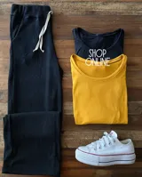 Pantalón negro de morley con corte palazzo y cintura elastizada con cordón.