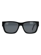 Lentes de sol RKF modelo Genova, armazón rectangular de acetato de celulosa negro y cristales oscuros polarizados con protección UV.