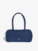 Bolso de hombro tipo cartera confeccionado en denim azul, con diseño rectangular, cierre superior y asas largas. Presenta el logo del Trifolio metálico en la parte frontal.