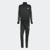 Conjunto deportivo Adidas Dayready de color negro con las clásicas tres tiras blancas en mangas y laterales del pantalón, confeccionado en suave tejido tricot de poliéster reciclado. Incluye campera con cierre frontal y cuello alto, y pantalón con cintura elástica ajustable.