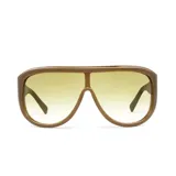 Lentes de sol estilo aviador oversize con armazón de acetato marrón y cristales degradados en tono amarillo.