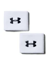Par de muñequeras deportivas Under Armour color blanco, confeccionadas con fibras de alto rendimiento que absorben y evacuan el sudor rápidamente. Presentan el logotipo bordado de la marca en color negro al centro.