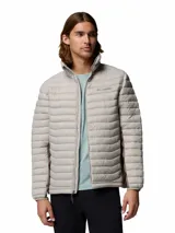 Campera híbrida Columbia con aislamiento térmico, diseño acolchado y paneles laterales elásticos. Cuenta con cierre frontal completo, cuello alto con protector de mentón y bolsillos laterales con cierre.