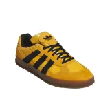 Championes Adidas Aloha Super, color amarillo con detalles en negro y suela de goma translúcida.
