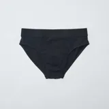 Pack de siete slips negros de punto con cintura elástica.