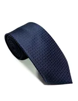 Corbata de seda azul marino con estampado paisley en tonos rosados y blancos.