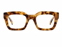 Armazón de receta con diseño geométrico de gran tamaño, fabricado en bio acetato con estampado carey claro.