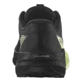 Championes Salomon Pulsar de trail running, color negro con entresuela en tono verde claro y negro, con amortiguación y suela de gran agarre.