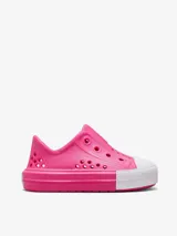 Zapatilla Converse CTAS Play color rosa, sin cordones, con puntera blanca y orificios de ventilación.