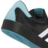Championes Adidas Nora color negro con detalles en blanco y celeste.
