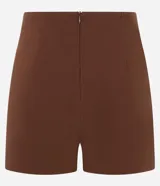 Short pollera corto color marrón de bengalina, con diseño cruzado en el frente, cierre invisible en la parte trasera y talle alto.