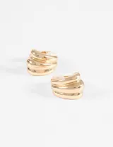 Caravanas tipo clip de diseño acanalado con acabado plateado brillante.