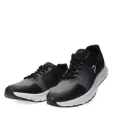 Championes deportivos Push en tonos negro y gris, con diseño de malla transpirable, suela blanca amortiguada y cierre con cordones.