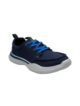 Championes urbanos Hush Puppies modelo Alfie Lace, color azul marino con cordones en azul vibrante y suela de EVA blanca. Confeccionados en material textil reciclado, presentan un diseño ligero con puntera redonda y tecnología de confort en la plantilla.