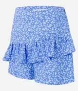 Short pollera de viscosa con estampado floral liberty, corte mini y volado delantero.