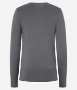 Suéter de punto color amarillo, con escote en V y mangas largas. Presenta un diseño básico y versátil, confeccionado en una mezcla de viscosa, poliamida y elastano.