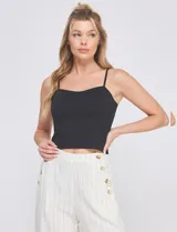 Top crop negro de corte ajustado, estilo corsé, con escote corazón y breteles finos regulables.