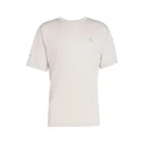 Remera deportiva Adidas de manga corta, color beige claro, con cuello redondo y logo de la marca estampado en el pecho. Confeccionada en tejido técnico transpirable con tecnologías Climacool y Aeroready.