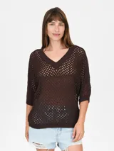 Buzo de punto calado color verde lima, con escote en V y mangas 3/4.