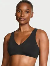 Bralette inalámbrico negro con escote en V y diseño cómodo para uso diario y descanso.