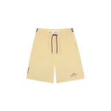 Short de baño Eme Studios, modelo Trop Lise, color amarillo claro con cordón ajustable y detalles en violeta. Cuenta con el logotipo de la marca estampado en la pierna izquierda.