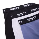 Pack de tres boxers Rusty modelo Tory en colores negro, gris y azul, con cintura elástica con logo de la marca en contraste.