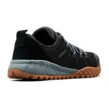 Championes Columbia Fairbanks Low Techlite, calzado de trekking y estilo urbano en color negro con suela de caucho marrón y entresuela gris. Cuentan con empeine de malla transpirable, sistema de cordones elásticos y la marca visible en el lateral. Incorporan tecnología Techlite para amortiguación y suela Omni-Grip para mayor tracción.