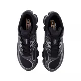 Championes urbanos New Balance modelo ABZORB U2000, color negro con detalles en gris. Presentan un diseño técnico con malla transpirable, refuerzos sintéticos y una suela con tecnología de amortiguación visible.