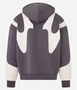 Saco tipo buzo con cierre frontal, confeccionado en tejido fleece. Presenta un diseño boxy con capucha, mangas largas de sisa desplazada y estampa abstracta en contraste. Cuenta con puños y bajo ajustados.