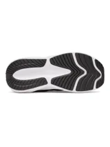 Championes Under Armour modelo W Surge 5, color negro con suela blanca, confeccionados con malla transpirable y entresuela de amortiguación.