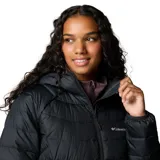 Campera larga tipo parka Columbia, modelo Powder Lite II Mid, color negro. Cuenta con tecnología Omni-Heat™ termorreflectante, aislamiento sintético Thermarator™ y tratamiento repelente Omni-Shield™. Presenta capucha integrada, cierre frontal completo, bolsillos laterales con cremallera y puños elásticos.