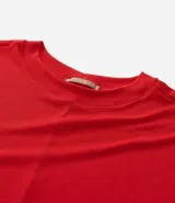 Blusa tipo muscle tee de Ashua, confeccionada en tejido ribana con textura acanalada, cuello redondo y diseño sin mangas.