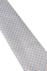 Corbata verde oscuro con estampado floral y pañuelo de bolsillo a juego.