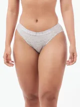 Bombacha de algodón elástico, corte clásico de talle medio, color gris jaspeado, con cinturilla elástica ancha que lleva el logo de Calvin Klein repetido.