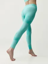 Calza deportiva larga de tiro alto, color turquesa con estampado tipo tie-dye y diseño ajustado.