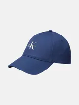 Gorra de béisbol Calvin Klein Jeans, color azul oscuro, con visera curva y logo bordado en blanco en el panel frontal.