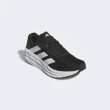 Championes de running Adidas Adistar 3, color negro con tres franjas laterales blancas. Presentan una entresuela gruesa blanca con diseño texturizado y suela negra.