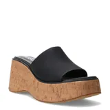 Sandalias de plataforma corrida tipo corcho, con capellada ancha de material sintético negro y diseño destalonado.