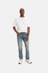 Jeans Levi's 501 Original Button Fly de corte recto, color celeste con lavado medio y cierre con botones.