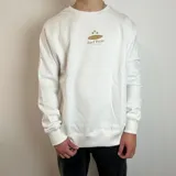 Buzo de cuello redondo en color blanco, con diseño estampado en el pecho que incluye palmeras y el texto Surf Point Santa Barbara.