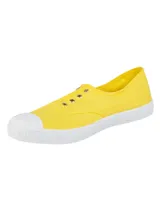 Zapatillas de lona modelo Greece de RKF, color amarillo con suela y puntera de goma blanca. Confeccionadas en algodón orgánico con ojalillos metálicos laterales y pequeña etiqueta decorativa.