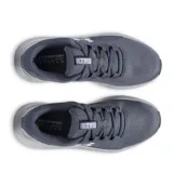 Championes Under Armour Charged Surge 4 de hombre, color azul marino con logo blanco y suela blanca.