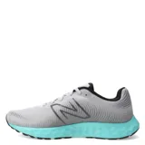Championes de running New Balance modelo 420 V3, con capellada de malla técnica gris y entresuela de espuma en color turquesa vibrante. Presentan el logo lateral característico de la marca y suela de goma negra con alta tracción.