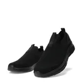 Championes urbanos Umbro modelo Glide, color negro, de diseño slip-on confeccionados en tejido de punto transpirable con suela de goma flexible.