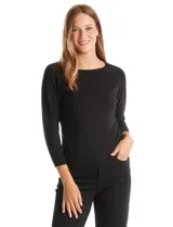 Buzo de tejido fino color beige, con cuello redondo, mangas tres cuartos y diseño raglán.