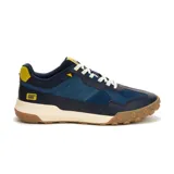 Championes Caterpillar modelo Hex Ready T-Toe para hombre, en color azul marino con detalles en amarillo, blanco y suela de goma marrón. Capellada combinada de cuero, paneles textiles y refuerzos sintéticos, con entresuela de EVA y cordones blancos.
