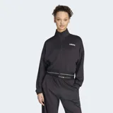 Campera deportiva Adidas Hyperglam Cropped Track Top de color negro, con cierre frontal completo, cuello alto y diseño de mangas murciélago. Presenta una cintura elástica con rayas blancas y el logo de la marca en el pecho.